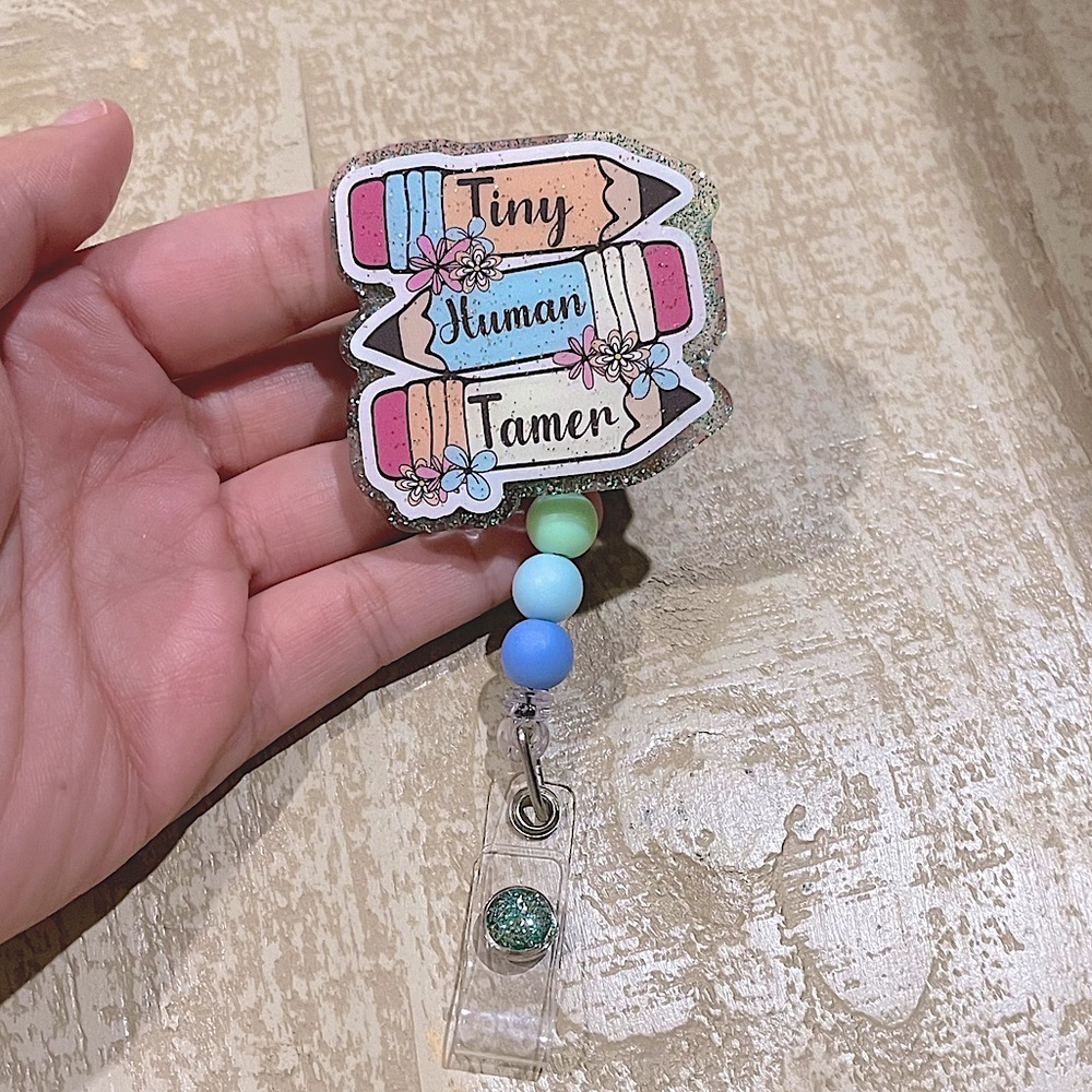 Tiny Human Tamer teacher badge reel